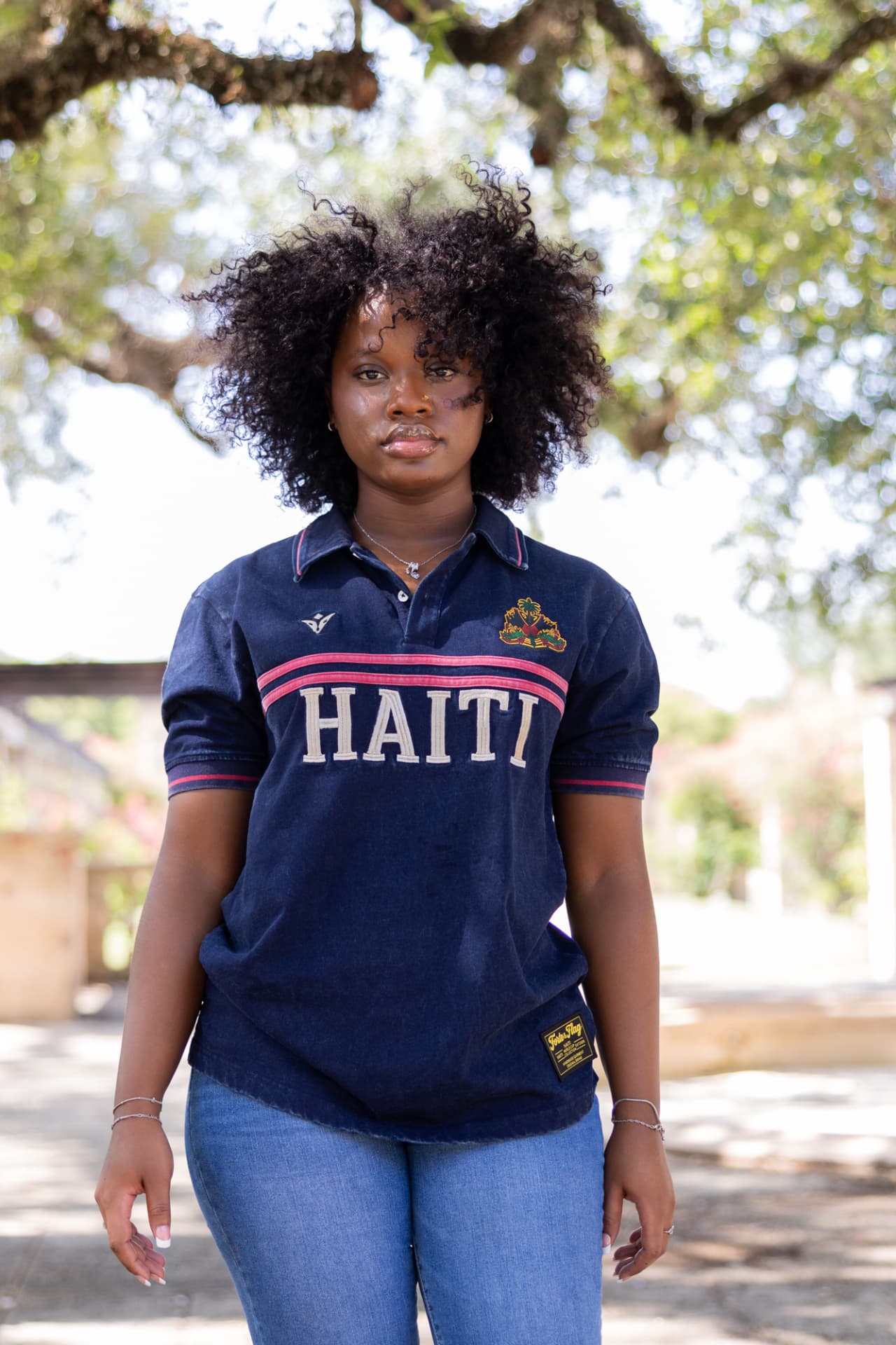 Deep navy heritage polo portrait